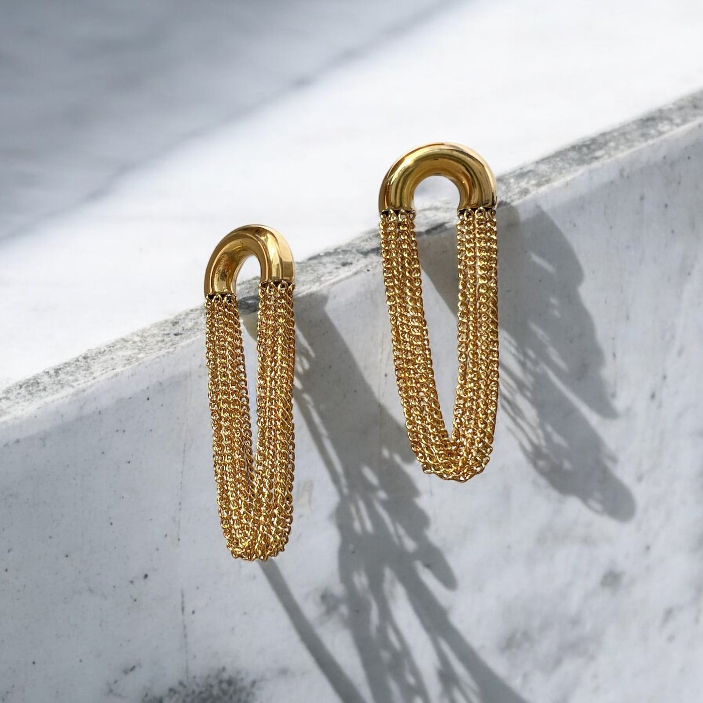 gold concert earrings