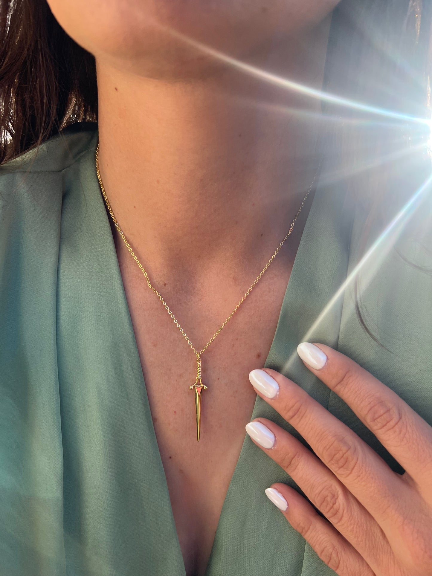 gold dagger necklace