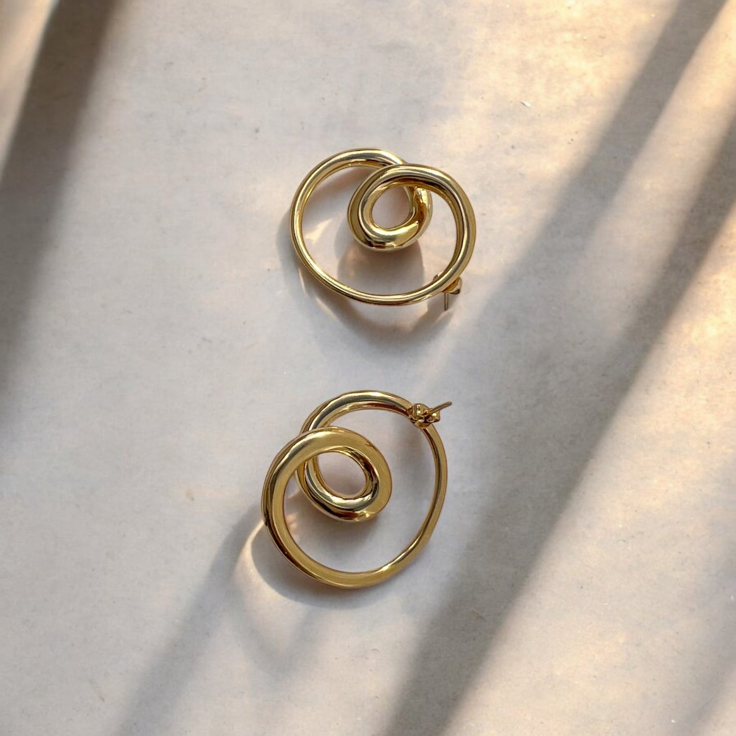 pretzel gold earrings