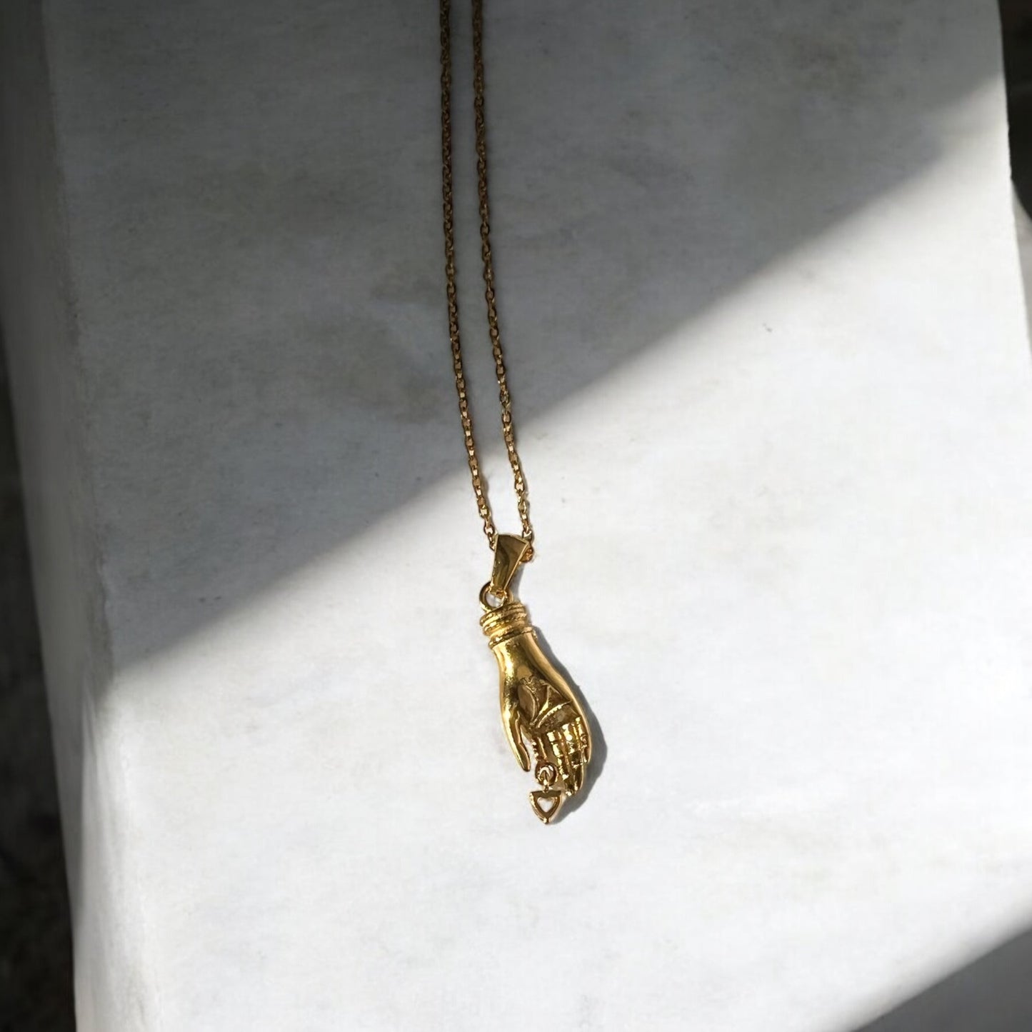 gold hand necklace