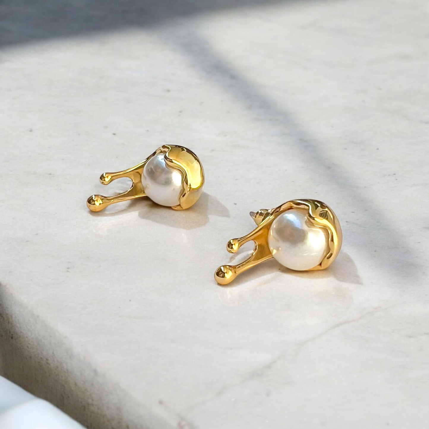 gold dripping pearls