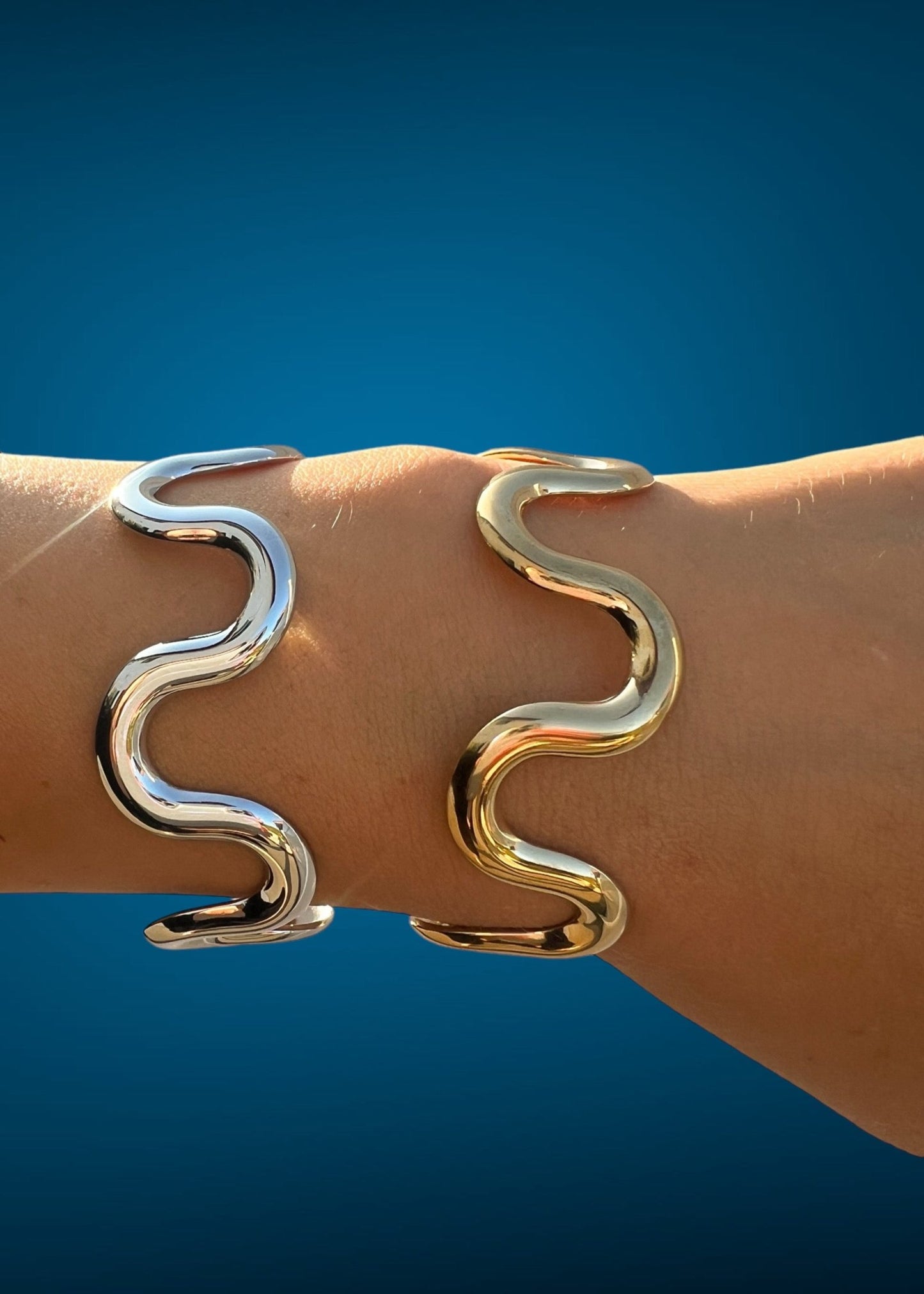 silver and gold wave bracelets