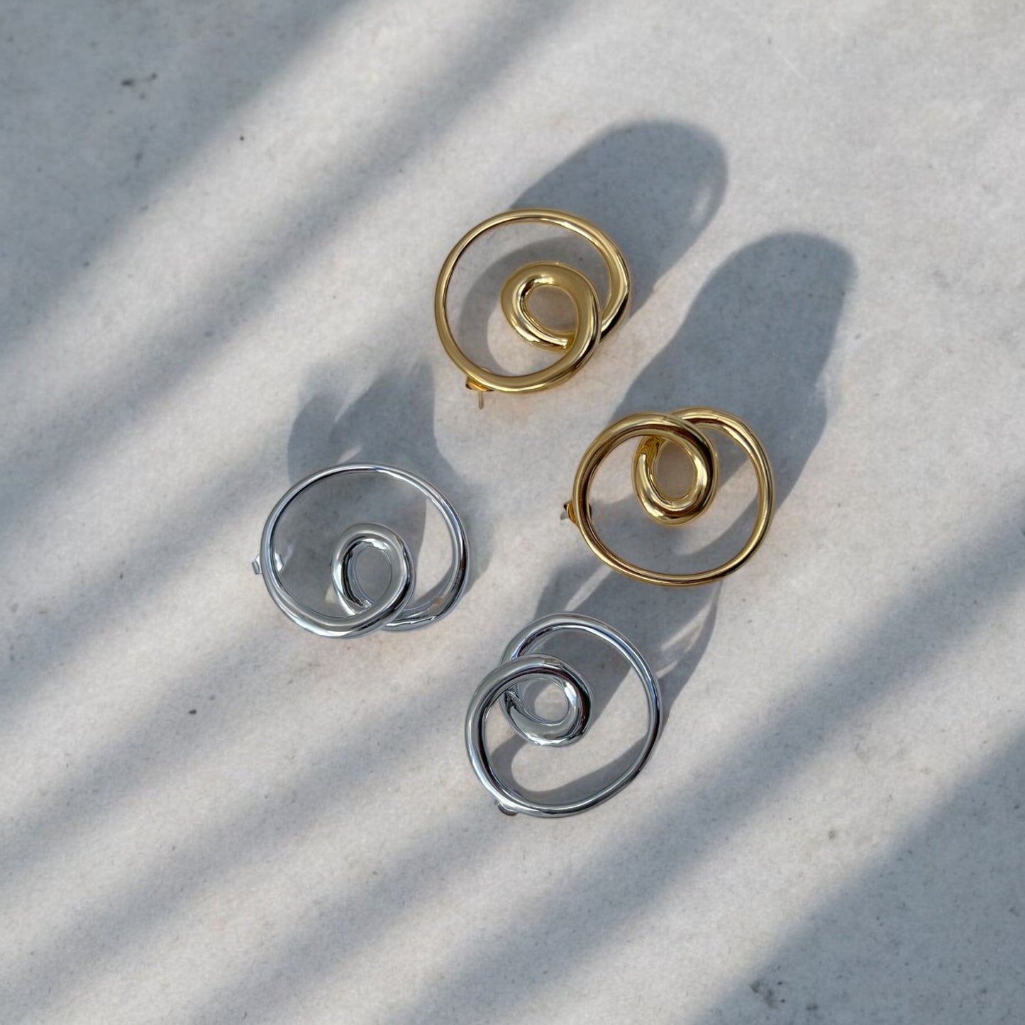 sculptural gold and silver jewelry