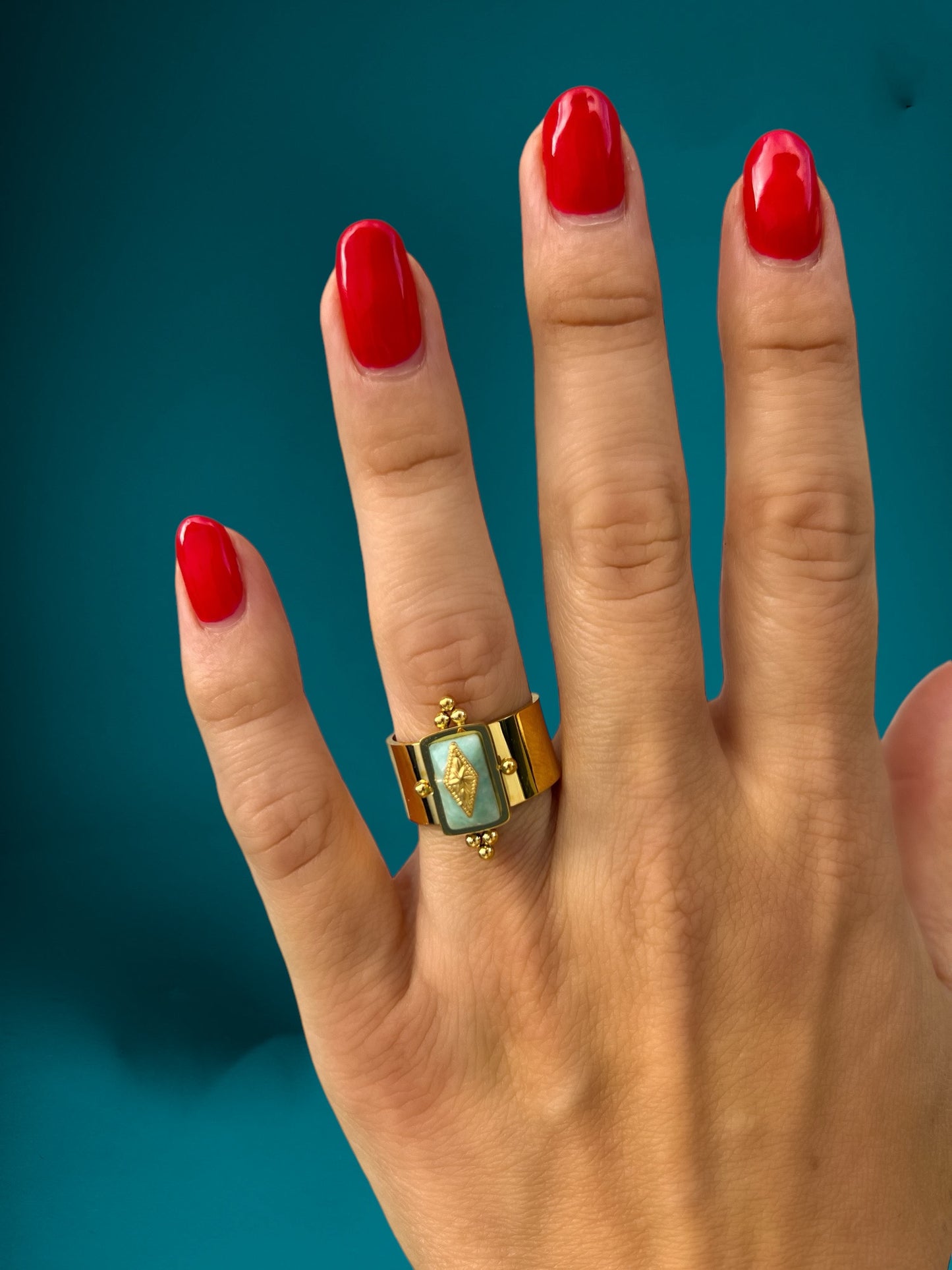 hand with statement ring
