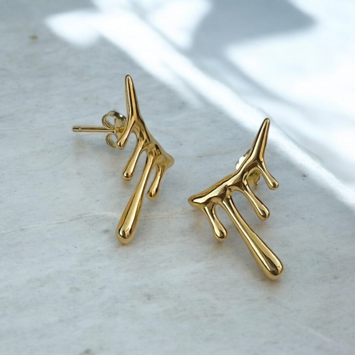 dripping gold earrings