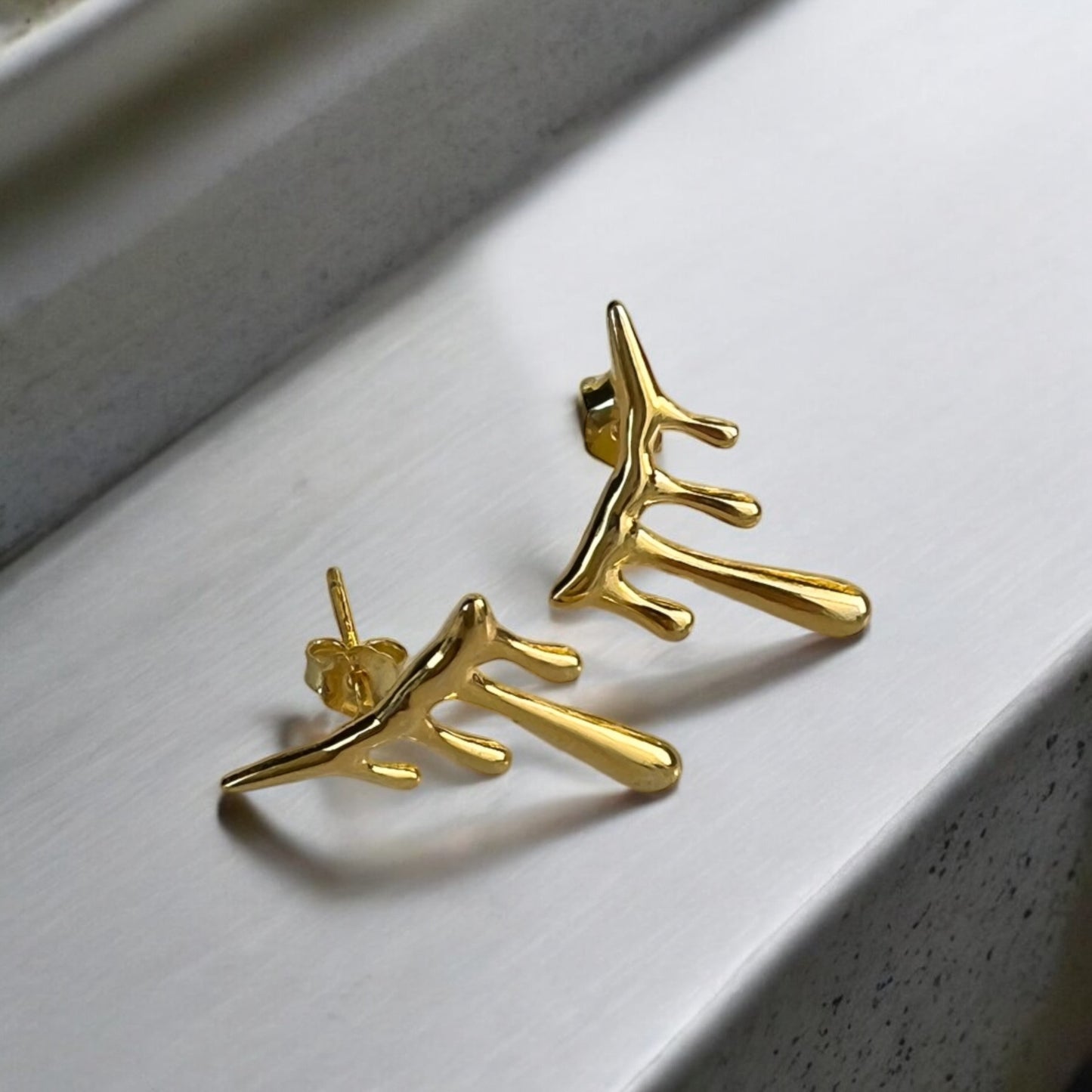 gold lava studs