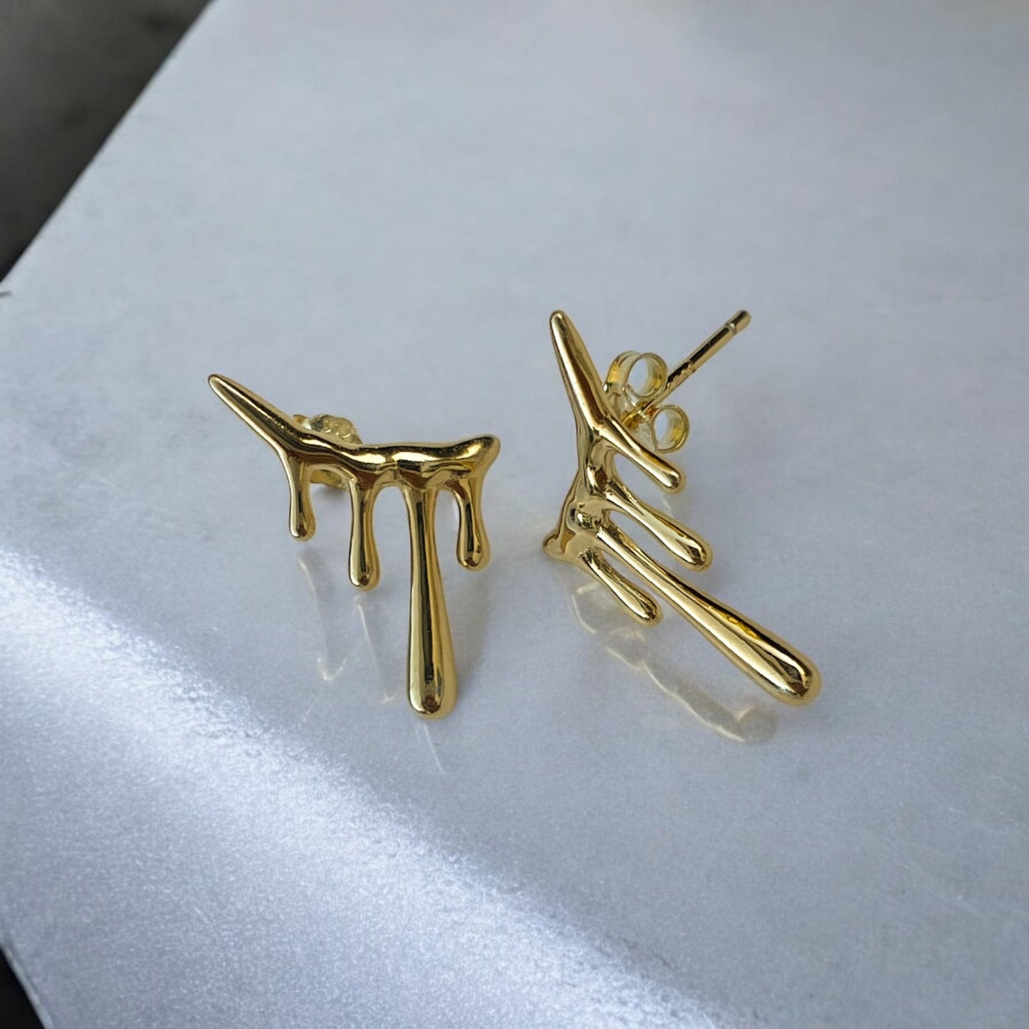 edgy gold earrings