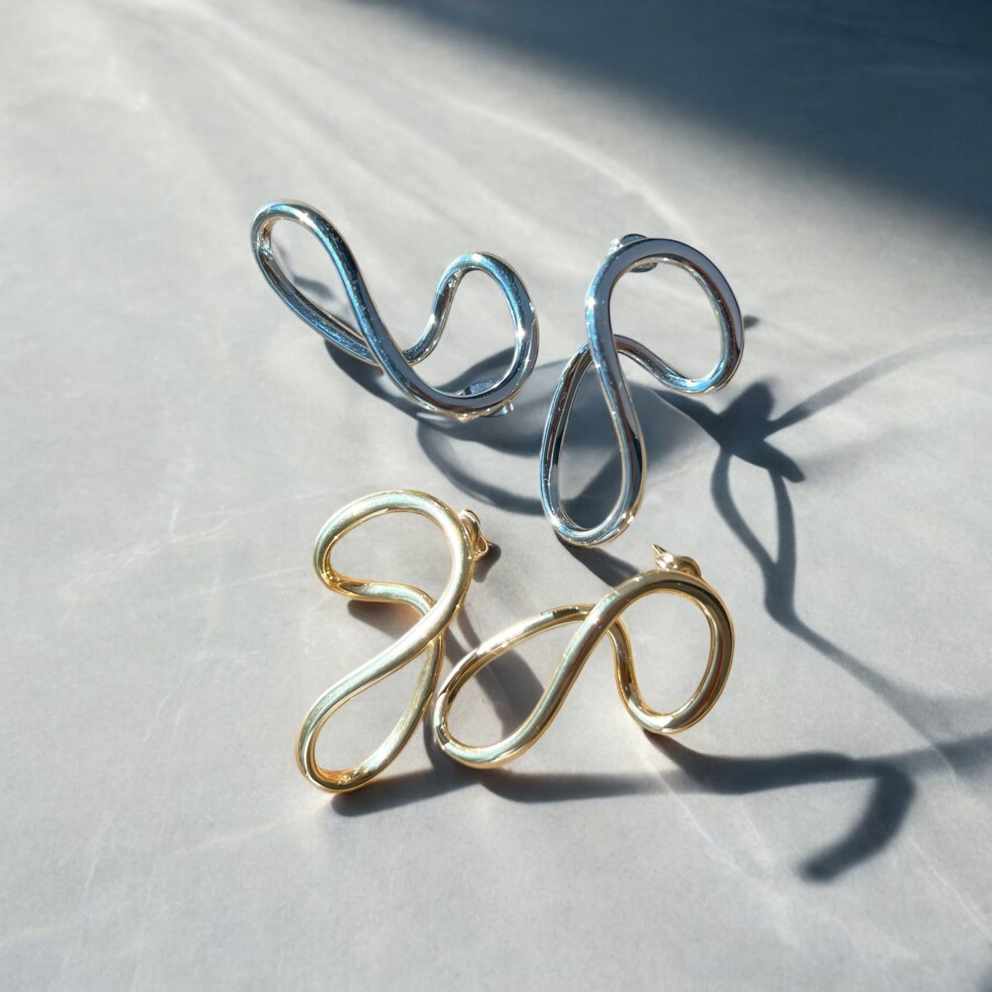 abstract silver and gold earrings