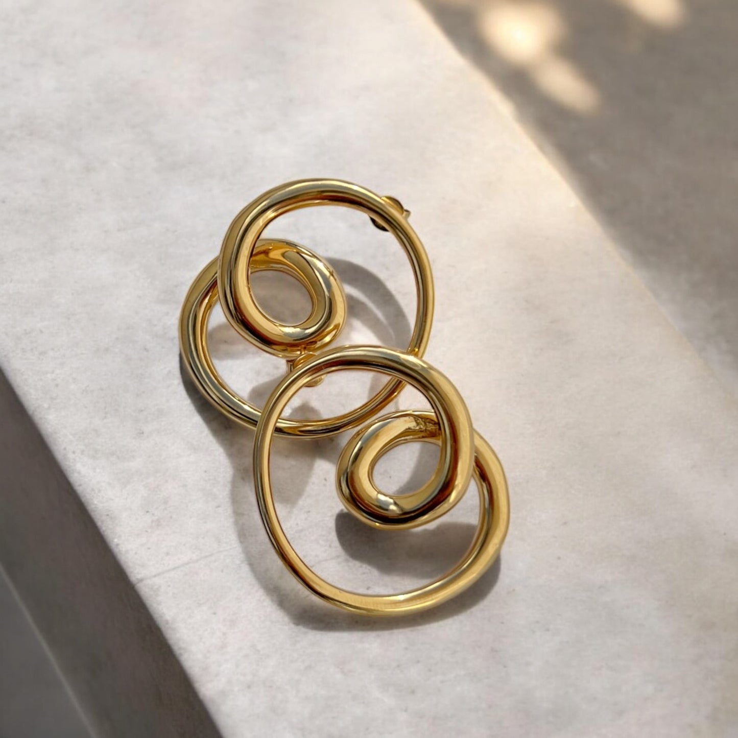 waterproof gold sculptural earrings